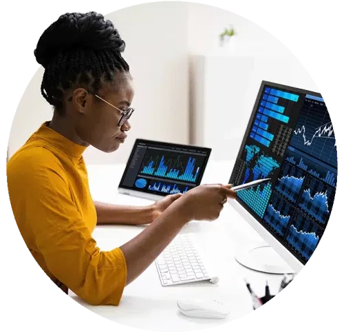 Woman looking at business insights tool on computer screen